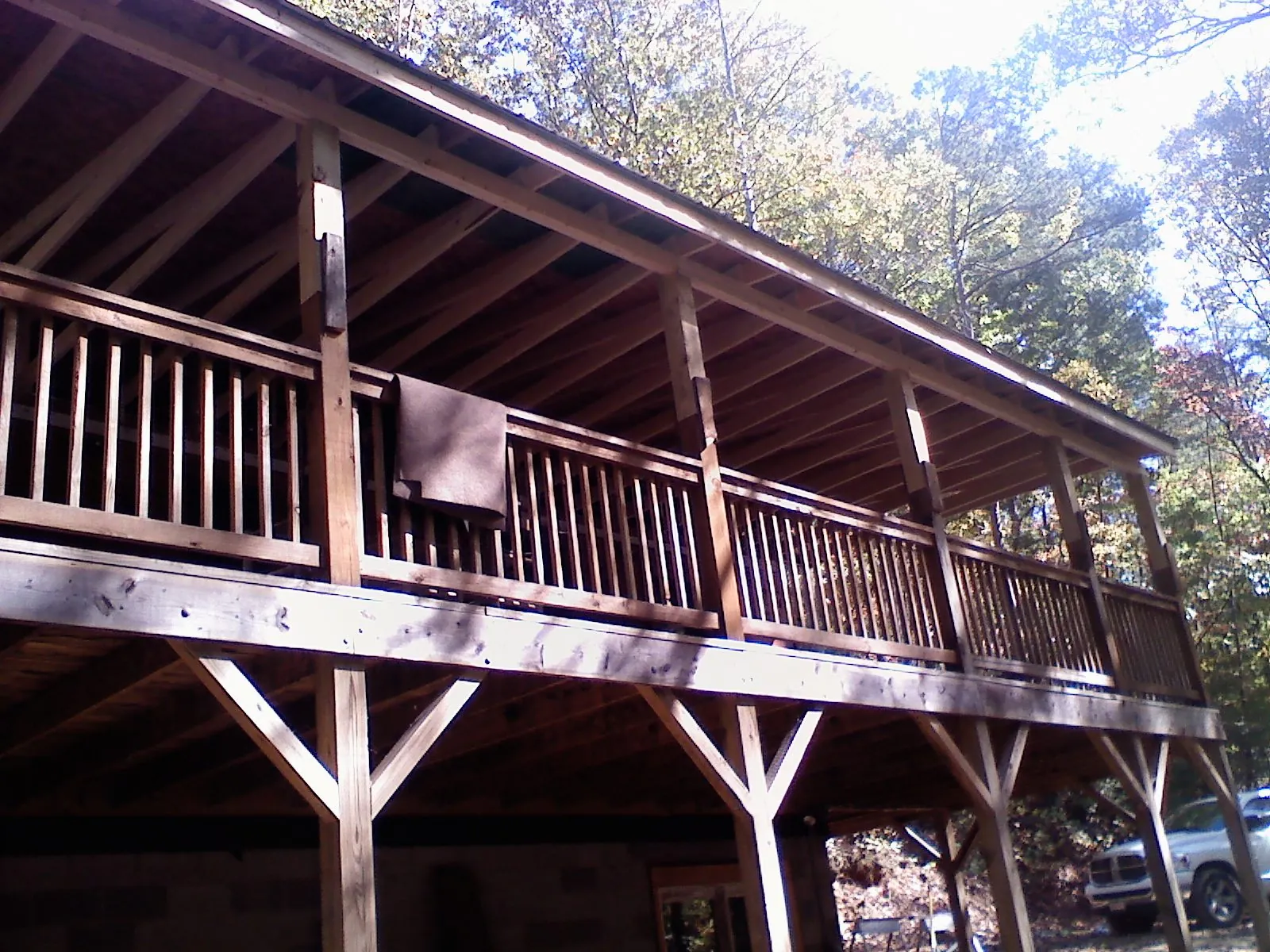Timber framing under a new elevated porch and deck — Roof Leak Repair in Vergas by Roofing Brothers